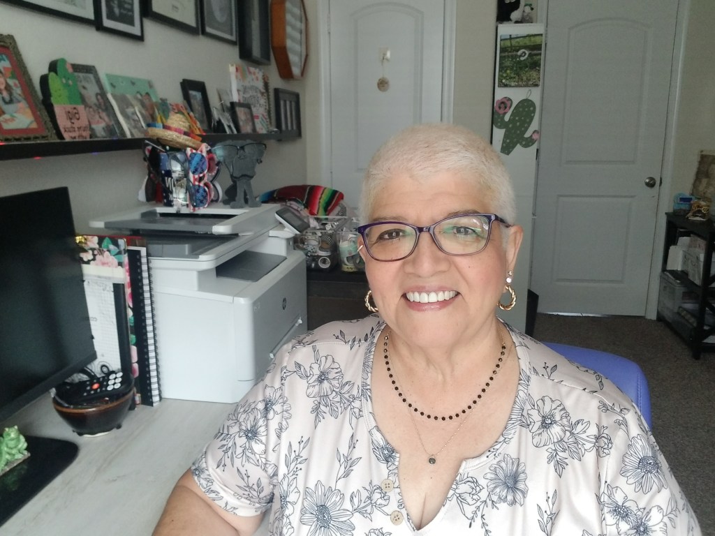 Woman modeling black-and-white floral Zeagoo top for eclectic style after 60